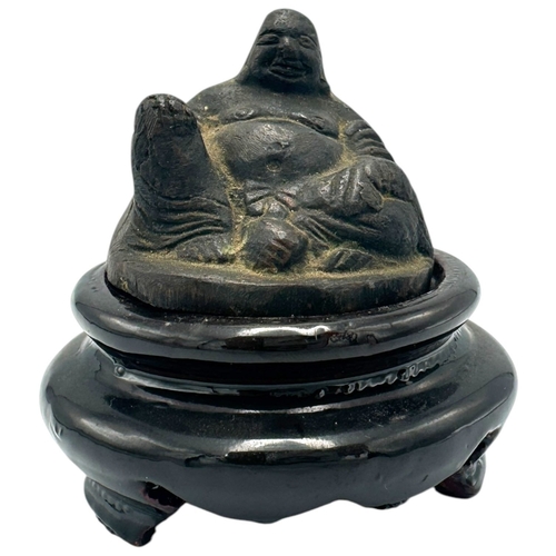 1471 - An antique Asian Bronze Buddha Sculpture on wooden Stand.
Bronze exterior showcasing a seated Buddha... 