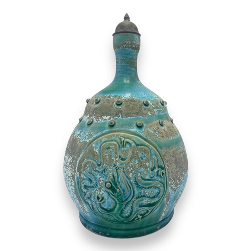 1576 - An antique Asian Celadon Ceramic Vase with Dragon Motif.
Antique ceramic vase with a green glaze, fe... 