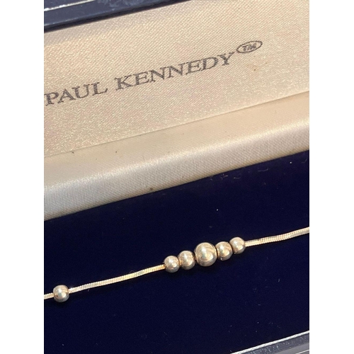 889 - A genuine Paul Kennedy Designer SILVER BOULES SLIMLINE BRACELET . Lightly gilded to appear as Gold. ... 