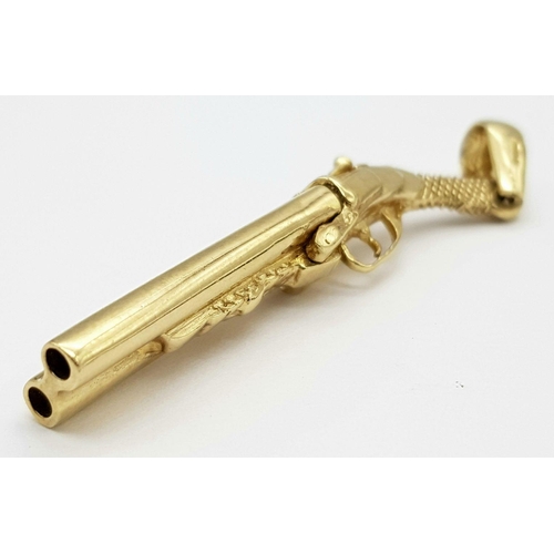 1483 - A 9K YELLOW GOLD DOUBLE BARRELLED VINTAGE SHOTGUN PENDANT WHICH IT ALSO COCKS, LOCK, STOCK & 2 SMOKI... 