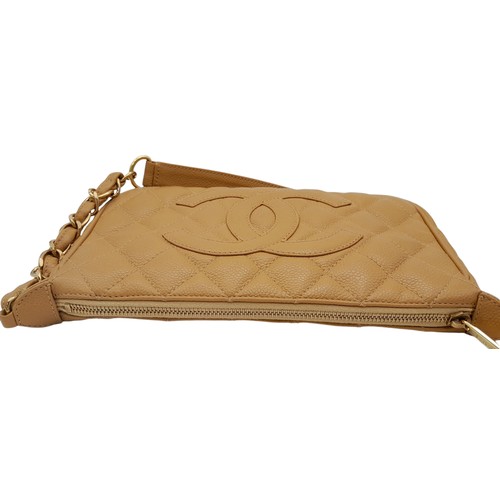 158 - A Chanel Beige Caviar Leather Shoulder Bag. Beige caviar leather exterior with gold-toned hardware a... 