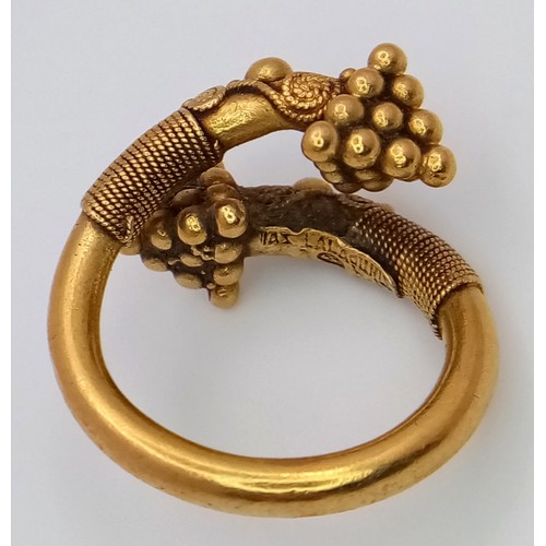 163 - An 18K Gold Etruscan Style Crossover Ring. Size F. 8.2g.