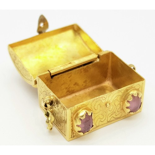 170 - An 18K Gold (tests as) Gem Set Treasure Chest Pendant. Opens - perfect as a pill box. 20mm x 15mm. 9... 