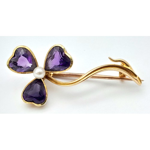 444 - An Antique 15K Yellow Gold, Amethyst and Pearl Brooch. 3.5cm. 3g