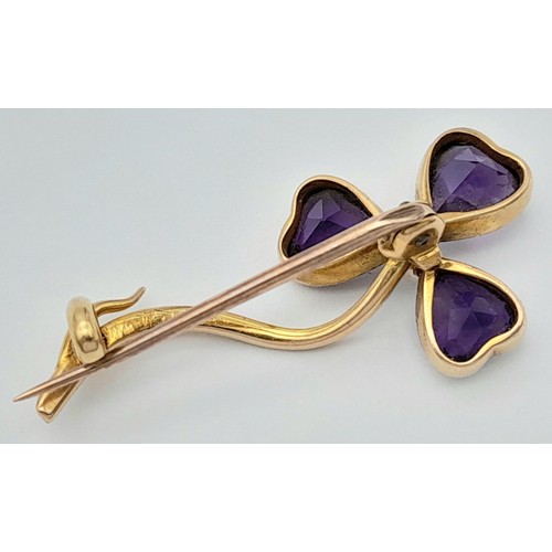 444 - An Antique 15K Yellow Gold, Amethyst and Pearl Brooch. 3.5cm. 3g