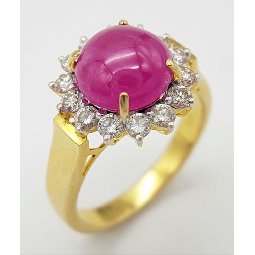 1497 - AN 18K YELLOW GOLD DIAMOND & CABACHON RUBY CLUSTER RING. 5.6G IN WEIGHT. SIZE M AND 1/2. Ref: 8841