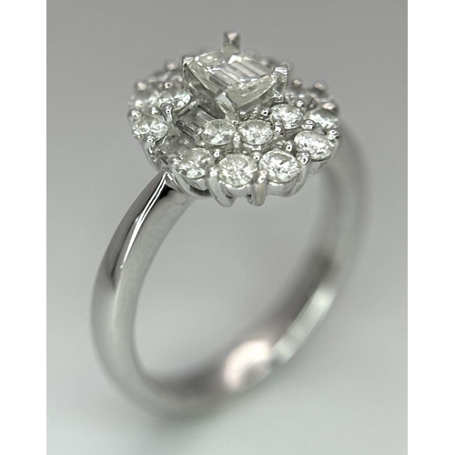 1504 - A BEAUTIFUL 18K WHITE GOLD, EMERALD CUT AND ROUND BRILLIANT CUT DIAMOND CLUSTER RING - 1CTW APPROX. ... 