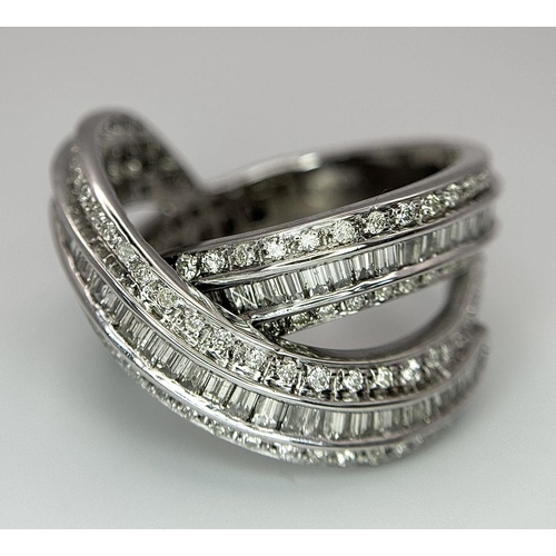 1511 - A 14K WHITE GOLD DIAMOND THREE ROW CROSSOVER RING  - COMBO OF ROUND AND BAGUETTE CUT DIAMONDS - 2CTW... 