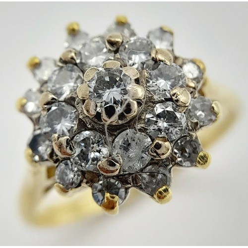 1758 - AN 18K YELLOW GOLD DIAMOND CLUSTER RING - 0.60CTW. 4.8G. SIZE L. TAN6017.