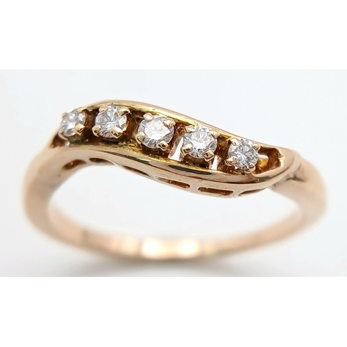 1615 - A 14K YELLOW GOLD DIAMOND TWIST BAND RING - 0.25CTW. 2.8G. SIZE O 1/2. A/S 1175