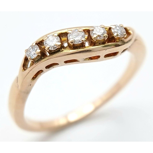 1615 - A 14K YELLOW GOLD DIAMOND TWIST BAND RING - 0.25CTW. 2.8G. SIZE O 1/2. A/S 1175