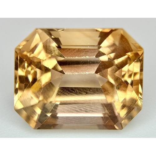 1123 - A 13.76ct Rare Imperial Topaz, Pakistan origin, in octagon step cut. Comes with GFCO certificate.