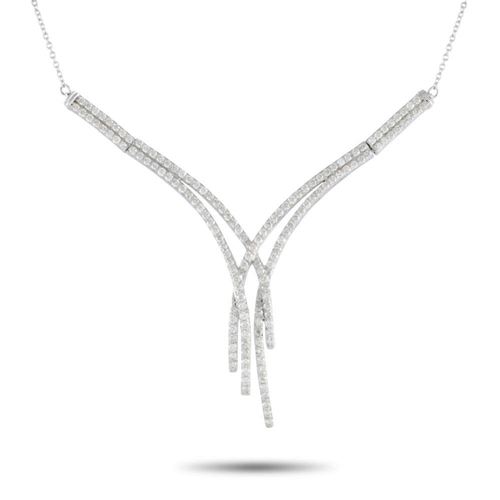 1065 - A 14K White Gold 1.50ct Diamond Necklace. Shimmering strands of Diamonds with a total weight of 1.50... 