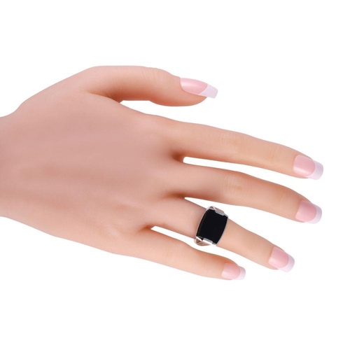 1096 - A Bvlgari Allegra 18K White Gold Black Onyx. A singular onyx gemstone serves as a stunning focal poi... 