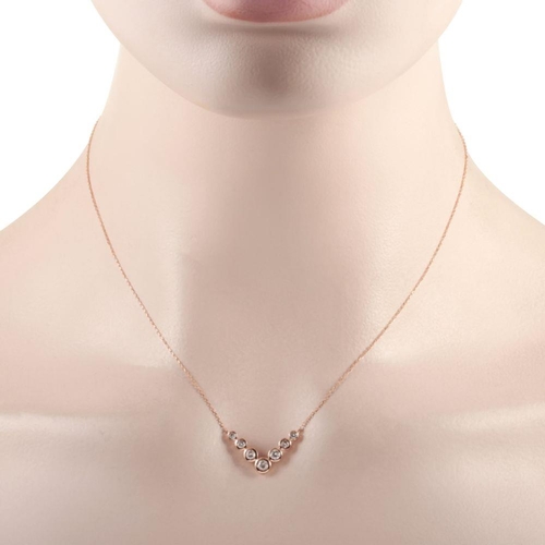 1117 - A 14K Rose Gold 0.50ct Diamond Pendant Necklace. This necklace is made of 14K rose gold and embellis... 