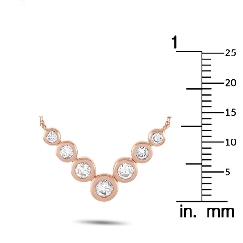 1117 - A 14K Rose Gold 0.50ct Diamond Pendant Necklace. This necklace is made of 14K rose gold and embellis... 