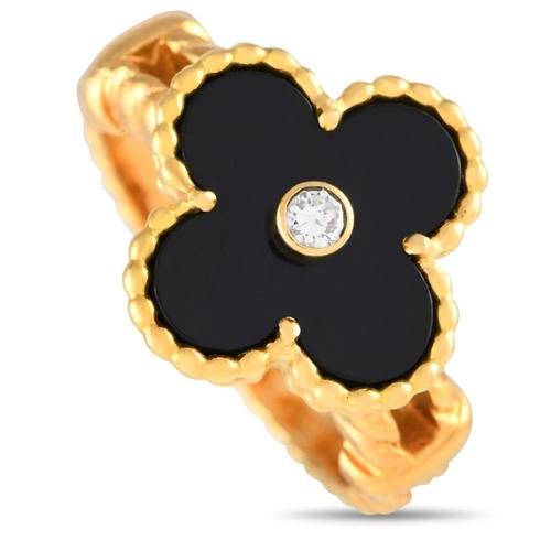 1285 - A Van Cleef & Arpels Vintage Alhambra 18K Yellow Gold Black Onyx Ring. Features an elaborate rope-tw... 