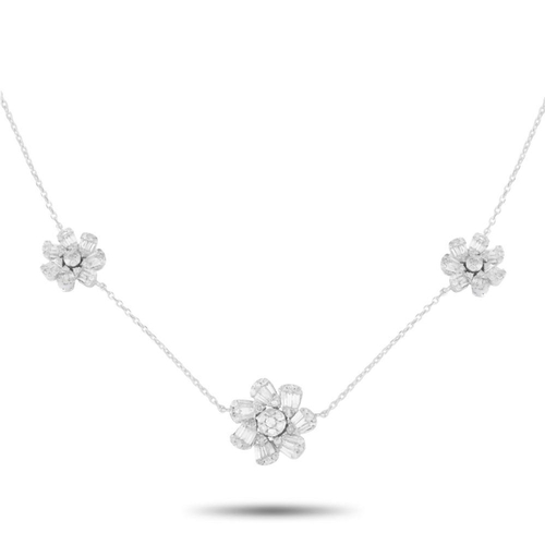 1292 - A 14K White Gold 1.20ct Diamond Three Flower Necklace. Sparkling Diamonds with a total weight of 1.2... 