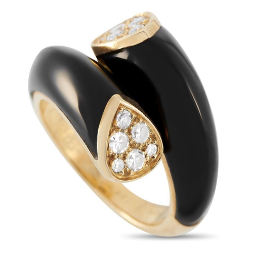 638 - A Van Cleef & Arpels 18K Yellow Gold 0.30ct Diamond and Onyx Bypass Ring. It features a bypass shank... 