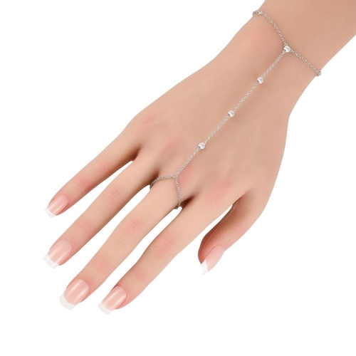 953 - A 14K White Gold 0.60ct Diamond Hand Chain Bracelet. Crafted from 14K white gold, this piece measure... 