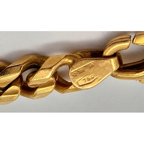 1068 - An 18K Yellow Gold Curb Link Chain. 60cm. 51.9g weight.