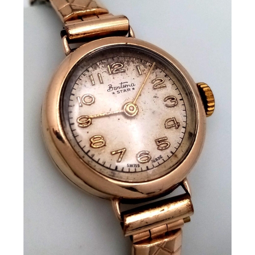 1037 - A 9K Yellow Gold Bentima Star Ladies Watch. Expandable gilded bracelet. 9K gold case - 21mm. Patinae... 