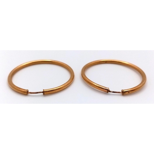 2426 - A Pair of 9K Yellow Gold Large Hoop Earrings. 3.5cm diameter. 3.77g.