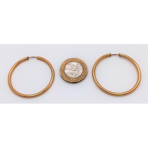 2426 - A Pair of 9K Yellow Gold Large Hoop Earrings. 3.5cm diameter. 3.77g.