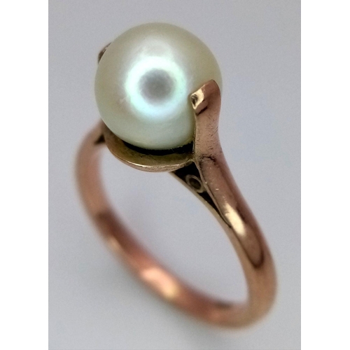 2442 - A 9K Rose Gold Pearl Solitaire Ring. Size M. 3.55g total weight.