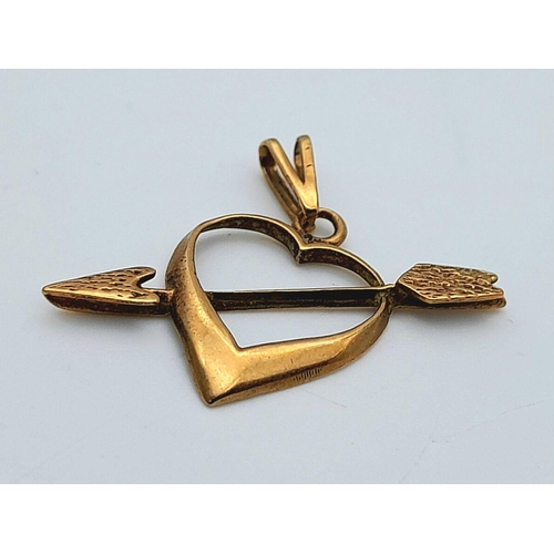 1223 - A 9K Yellow Gold Cupid Pendant. 2cm. 0.7g.