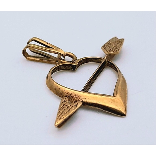 1223 - A 9K Yellow Gold Cupid Pendant. 2cm. 0.7g.