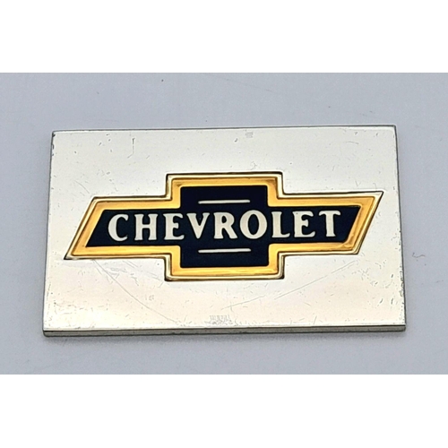 1224 - A STERLING SILVER CHEVROLET CAR MANUFACTURER PLACK. 23G