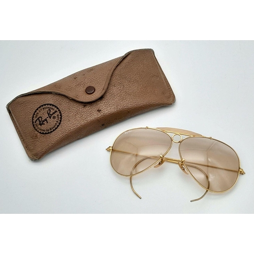 1291 - A Pair of Vintage 1970s Bausch and Lomb Ray-Ban Photochromic Shooters Sunglasses. Comes with case.