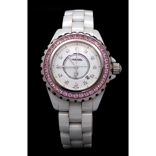 135 - A Chanel J12 White Ceramic Ladies Quartz Watch. Ceramic bracelet and case - 34mm. White dial with di... 