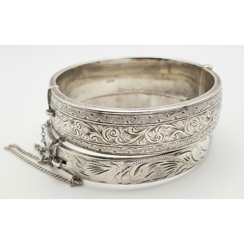 1557 - Two Vintage Solid Silver 925 Bangles, Total weight: 42.3 grams, Approx. 6cm diameter, with safety ch... 