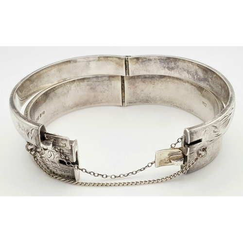 1557 - Two Vintage Solid Silver 925 Bangles, Total weight: 42.3 grams, Approx. 6cm diameter, with safety ch... 