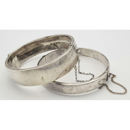 1557 - Two Vintage Solid Silver 925 Bangles, Total weight: 42.3 grams, Approx. 6cm diameter, with safety ch... 