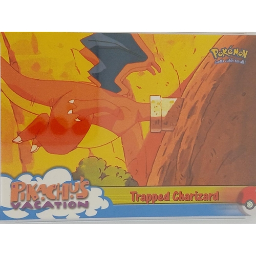 1600 - A 1999 Topps Pokémon: The Movie Edition card featuring Trapped Charizard (Card #51) in Movie Edition... 