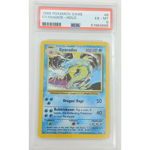 1690 - A 1999 Pokémon Game TCG card featuring Gyarados (Card #6) in Holo variety. Authenticated and graded ... 