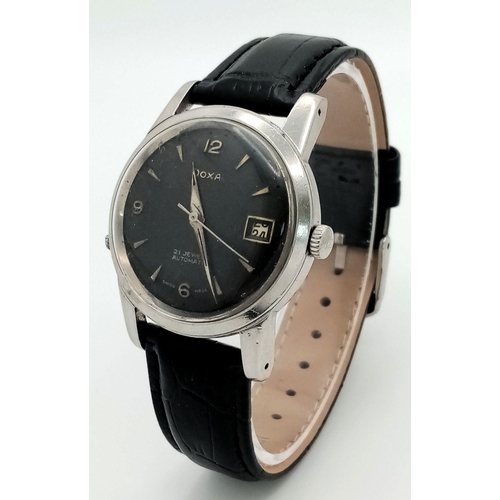 1719 - A Vintage Doxa 21 Jewels Automatic Gents Watch. Black leather strap. Stainless steel case - 34mm. Bl... 