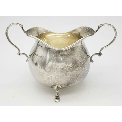 1783 - An antique sterling silver cream jug. Full Birmingham hallmarks, 1928. Total weight 111.4G. Height 7... 