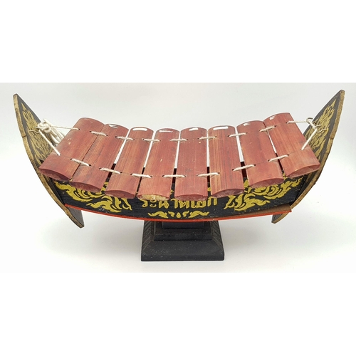 1997 - A Thai Bamboo Wooden Xylophone Ethnic Music Instrument with 8 keys. Approx 18cm x 39cm. As found.