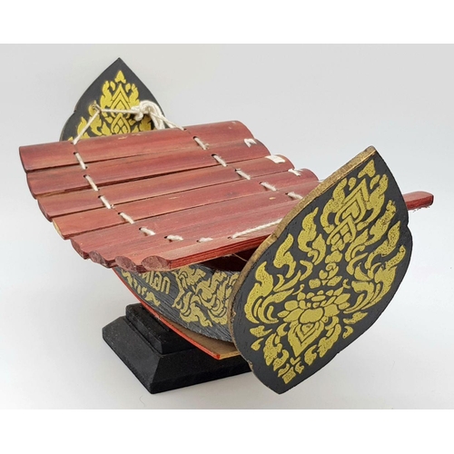 1997 - A Thai Bamboo Wooden Xylophone Ethnic Music Instrument with 8 keys. Approx 18cm x 39cm. As found.