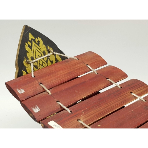 1997 - A Thai Bamboo Wooden Xylophone Ethnic Music Instrument with 8 keys. Approx 18cm x 39cm. As found.