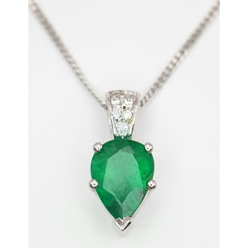 2085 - An 18K White Gold and Emerald Pendant on an 18K White Gold Disappearing Necklace. A 1ct pear shaped ... 