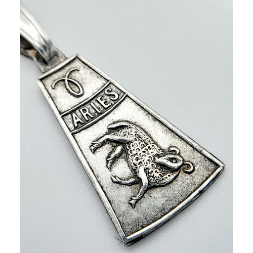 1857 - A vintage silver Aries sign pendant on 935 silver chain. Total weight 2.9G. Total length 44cm.