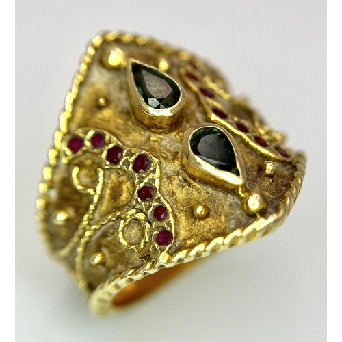 1967 - A 14k Yellow Gold Etruscan Style Emerald and Ruby Set Ring. 
Size Q. 7.8g.