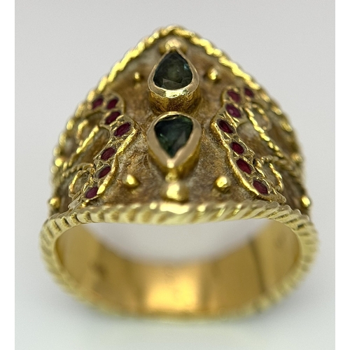 1967 - A 14k Yellow Gold Etruscan Style Emerald and Ruby Set Ring. 
Size Q. 7.8g.