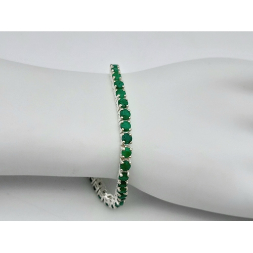 2011 - An Emerald Gemstone Tennis Bracelet. Set in 925 Silver. CD-1604.