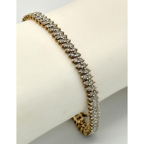 722 - A 9K YELLOW GOLD DIAMOND SET BRACELET. 0.75CT APPROX. 9.7G TOTAL WEIGHT. 18CM. M9004